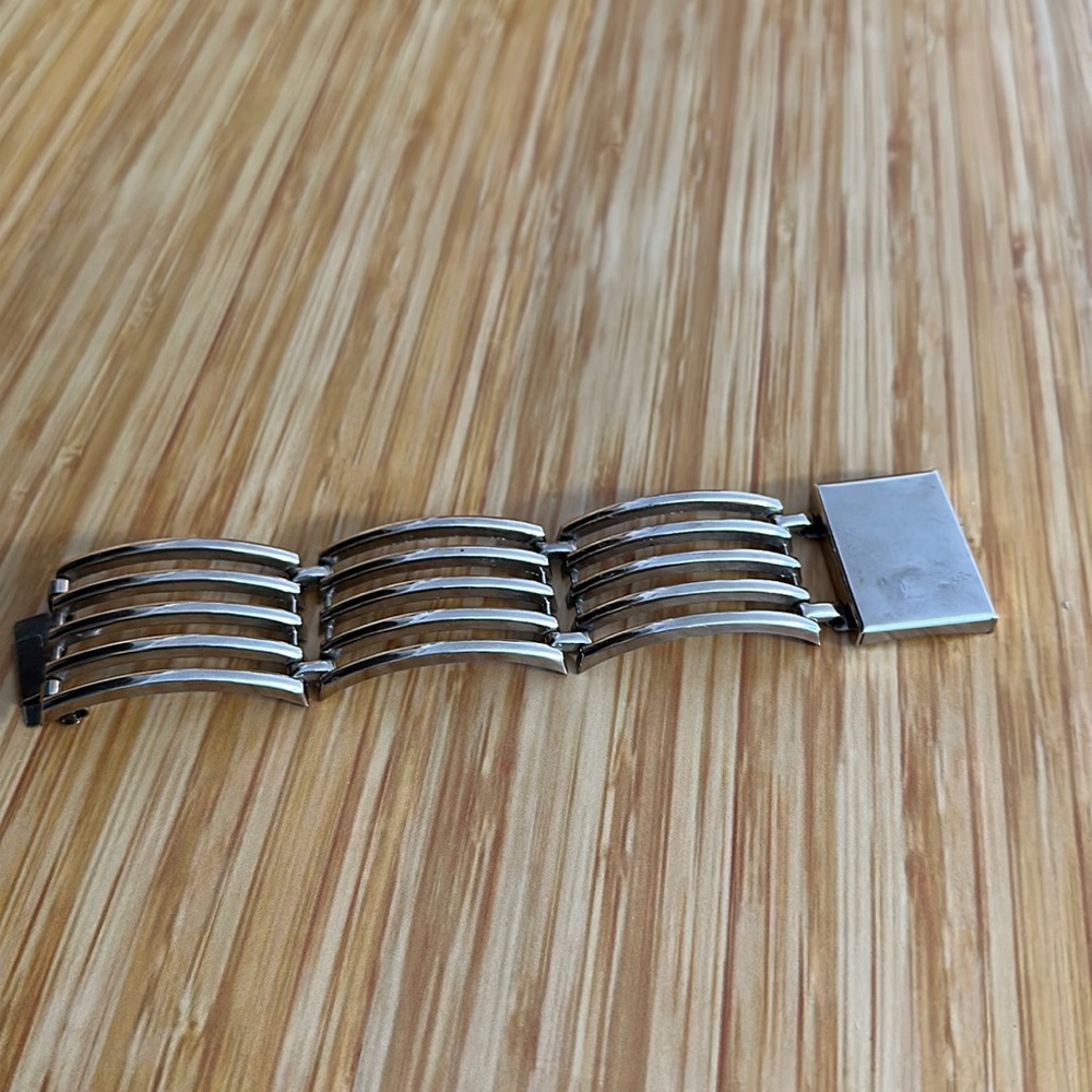 Such a cool vintage 1.5” thick aluminum material bracelet